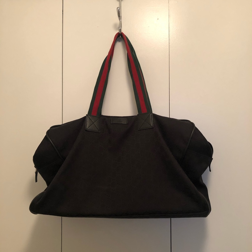 Gucci GG monogram duffle bag with signature straps
